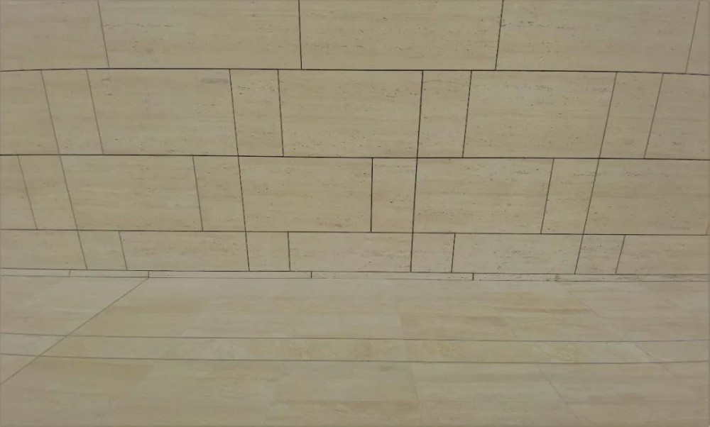 大堂僅掛一種石材(意大利洞石)的墻面內(nèi)裝工程技術(shù) 新保利大廈大堂用意大利進(jìn)口洞石裝飾墻面應(yīng)用